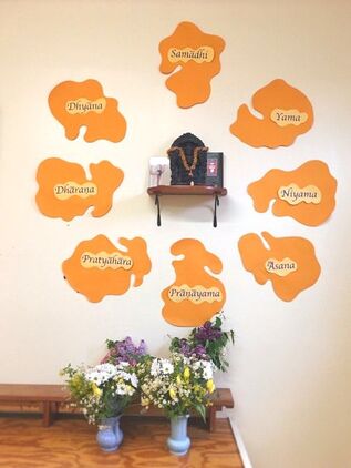 Pantajali altar with flowers and eight paths